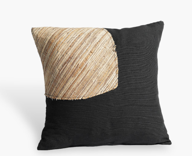 Black cushion cover with natural fiber patchwork texture, modern and stylish home decor pillow